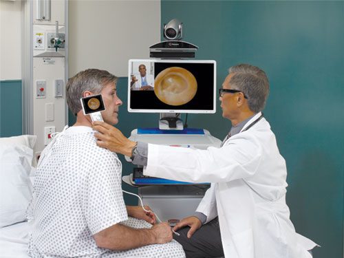 Doctor using CareLink Telemedicine Workstation