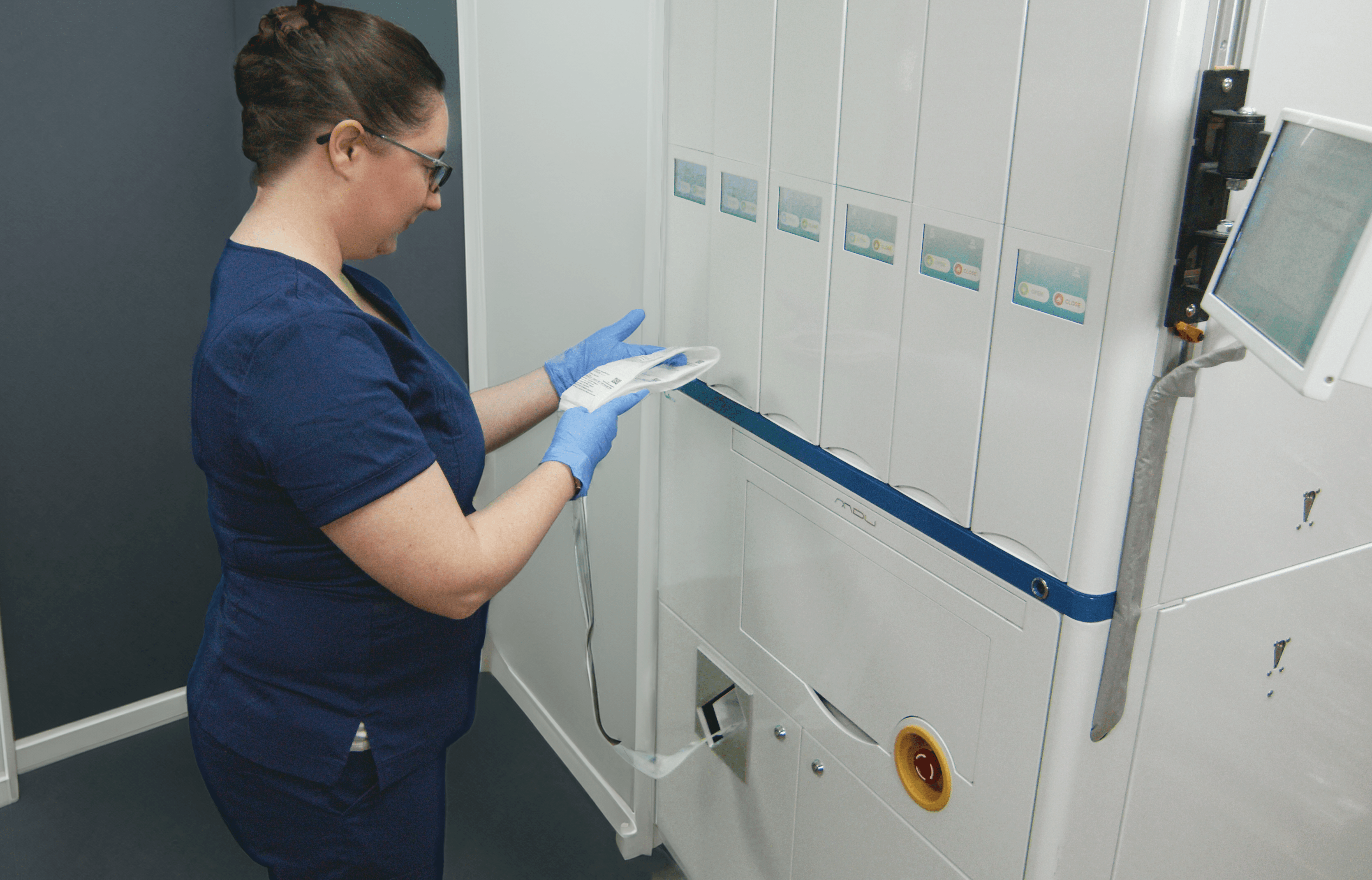 Corrections Nurse using NexPak Medicaiton Strip Packaging Solution